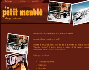 Petit Meubl�, right next to the lifts, 5 mins to the resort centre - walk out, ski back.